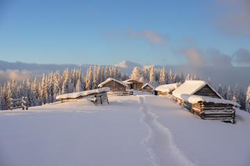 Wonderful morning in the mountainous valleys with houses in the Ukrainian Carpathians.