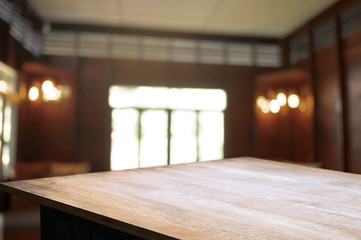 Fototapeta premium wooden table with blurred modern home background