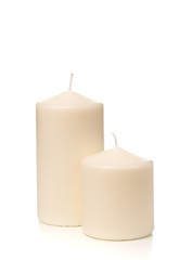 Fototapeta na wymiar White candle on white background isolated. Set of wax candle