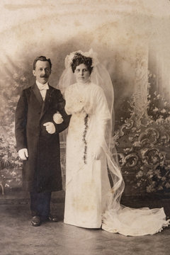 RUSSIA - CIRCA 1905-1910: Wedding shot of just married couple in studio, Vintage Carte de Viste Edwardian era photo