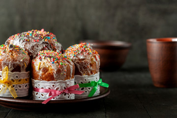 Freshly baked cake stands on the table. Side view.