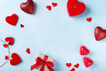 Valentines day background with gift box and red hearts. Holiday greeting card.