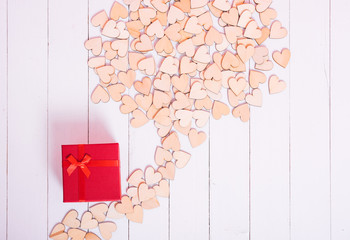 Wood hearts on pink background have symbol,