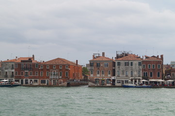 Fototapeta na wymiar on a boat through the canals of venice