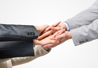 Obraz premium Concept of teamwork and unity with palms one on one in pile