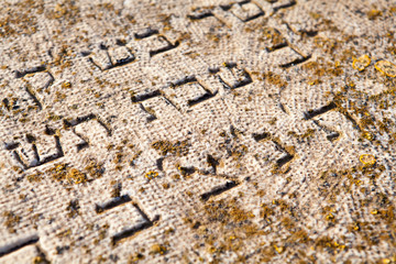 Fototapeta premium View of a Jewish tombstone in a cemetery