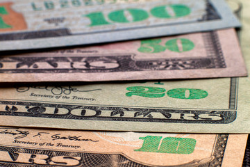 Money, prosperity and finances concept. Abstract light background of American USA national currency...