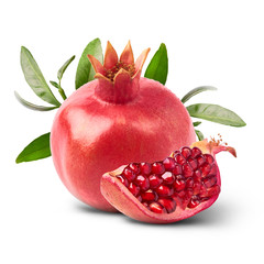 Fresh ripe pomegranate with green leaves isolated on white background.