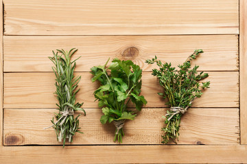 Bunch of rosemary, coriander and thyme, organic plants for healthy food