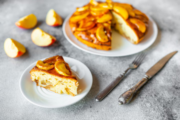Food, dessert, pastries, pie. Tasty beautiful apple pie on a concrete background
