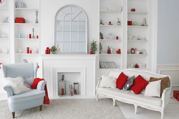 luxury apartments with fireplace, mirror, sofa, with white walls and red and blue decor