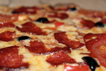 Diablo pizza with olives, smoked sausage