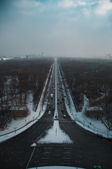 Great view of winter Berlin from Victory Column in the city center. Snow and sun