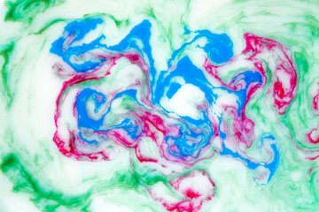 Abstract colored background. Stains of paint on the surface of the water. Ebru art, marbled paper.