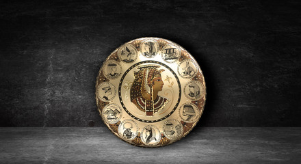 Egyptian goddess Cleopatra, the queen of ancient Egypt. The dark room, the rays of light. Abstract Egyptian dark background.