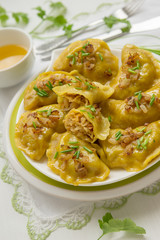Dumplings with cabbage and fried onions. This is a very popular food in Poland, Ukraine and Russia