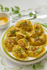 Dumplings with cabbage and fried onions. This is a very popular food in Poland, Ukraine and Russia