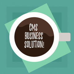 Conceptual hand writing showing Cms Business Solution. Business photo text software application use to create and analysisage website Top View of Drinking Cup Filled with Beverage on Color Paper
