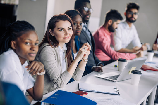Interracial Group of male and female teachers learning facilitators visiting conference devoted to problems for HIV AIDS