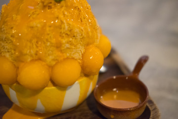 Korean shaved ice dessert with sweet toppings and fruit