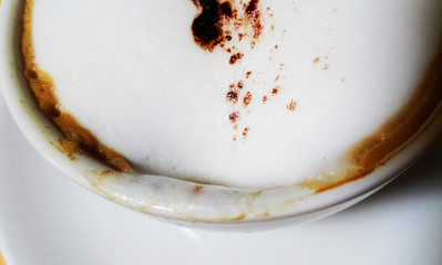 Delicious smooth milk foam with cappuccino hot coffee texture on white cups