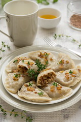 Dumplings with buckwheat porridge and fried onions. This is a very popular food in Poland