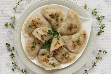 Dumplings with buckwheat porridge and fried onions. This is a very popular food in Poland