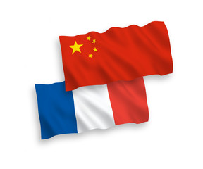 Flags of France and China on a white background
