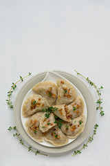 Dumplings with buckwheat porridge and fried onions. This is a very popular food in Poland