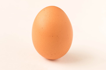 Chicken egg isolated on white background. Close up.
