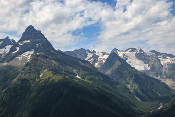 Fototapeta na wymiar Closeup view mountains scenes in national park Dombai, Caucasus, Russia, Europe