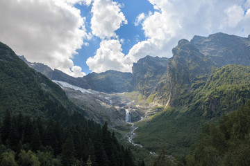 Obraz premium Closeup view mountains scenes and far away waterfall in national park of Russia