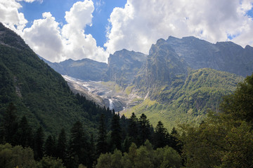 Fototapeta na wymiar Closeup view mountains scenes and far away waterfall in national park of Russia