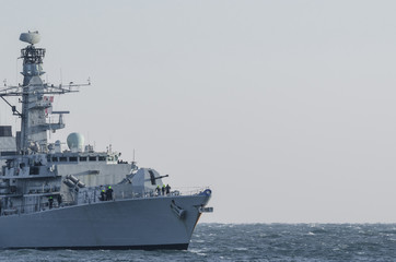 WARSHIP - Shapely frigate on a patrol in the sea