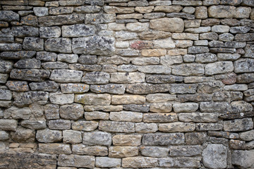 Muro in pietra grigia