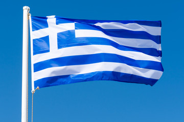 developing in the wind the flag of Greece
