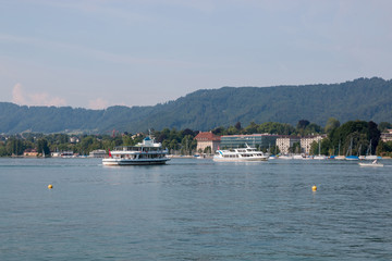 Fototapeta na wymiar View on lake Zurich and mountains scenes, Zurich, Switzerland, Europe.