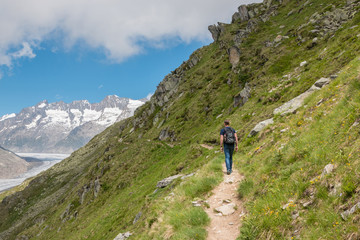 Fototapeta na wymiar Mountains scenes, walk through the great Aletsch Glacier