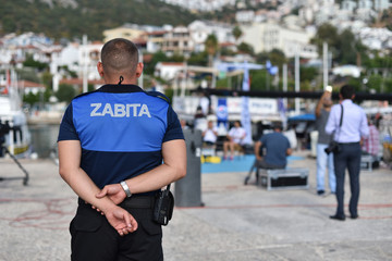 Turkish policeman of Zabita (Turkey municipal police) is guard measures