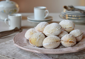 Walnut shaped cookies with cream. Shortbread with caramel and walnuts stuffing. Russian or ukrainian sweets oreshki.  Copy Space.
