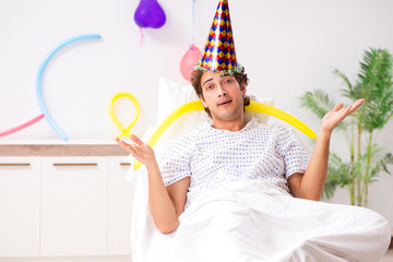 Young man celebrating his birthday in hospital