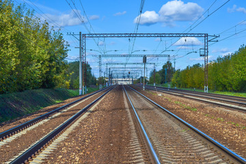 A lot of railway tracks stretching into the distance. Electrified road. Moscow region, Russia