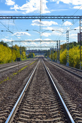 A lot of railway tracks stretching into the distance. Electrified road. Moscow region, Russia