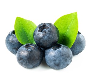 Pile of blueberries and leaves isolated on white background