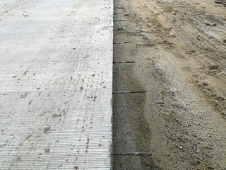 Fototapeta premium detail concrete road and dirty ground