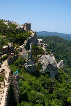 The Castle of the Moors on the top of the  rocky cliff.  Sintra. Portugal