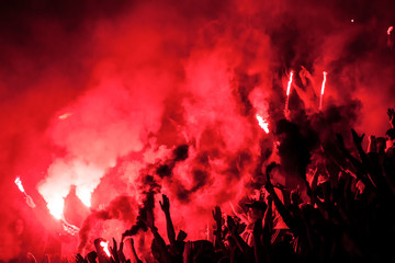 Football fans lit up the lights, flares and smoke bombs. Protest concept.