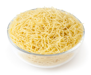 Uncooked vermicelli pasta in glass bowl isolated on white background with clipping path