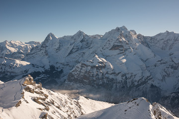 this is the famous view to jungfrau, monch and eiger in switzerland, view from top of shilthorn.