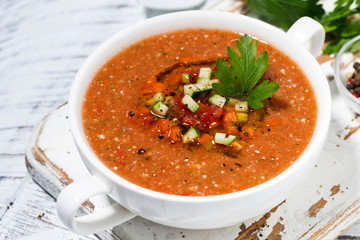 cold tomato soup in a bowl, closeup